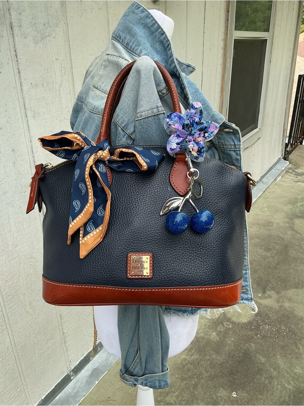 Dooney & Bourke Navy Pebbled Leather Satchel with Brown Trim and Blue Charm